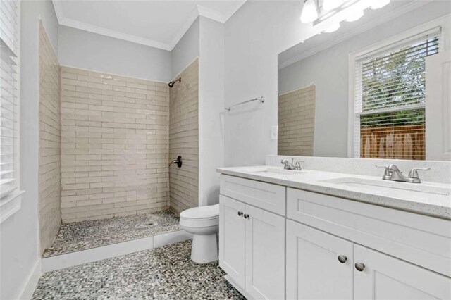 1283 Mercer, East Point, GA 30344 - bathroom featuring double vanity, tiled shower, and crown molding