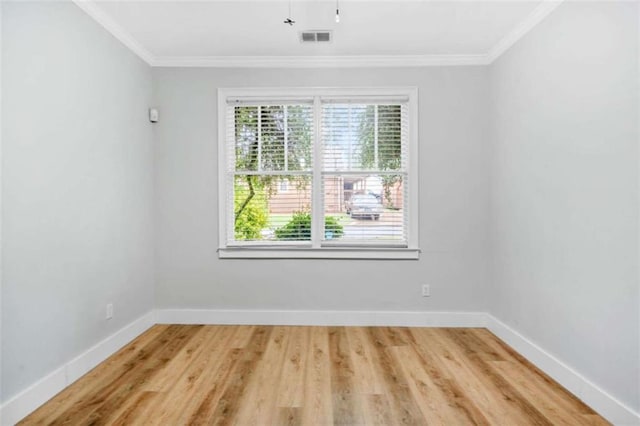 1283 Mercer, East Point, GA 30344 - empty room with ornamental molding and light wood-type flooring