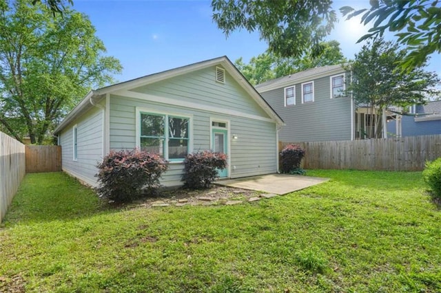 1283 Mercer, East Point, GA 30344 - back of house featuring a patio and a fenced backyard