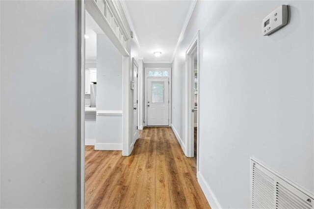 1283 Mercer, East Point, GA 30344 - hall featuring ornamental molding and light wood-style flooring