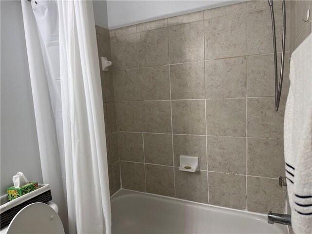 2107 Hailston Dr, Duluth, GA 30097 - bathroom with shower / bathtub combination with curtain and toilet