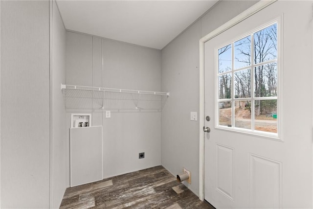 washroom with hookup for a washing machine, dark hardwood / wood-style floors, and hookup for an electric dryer