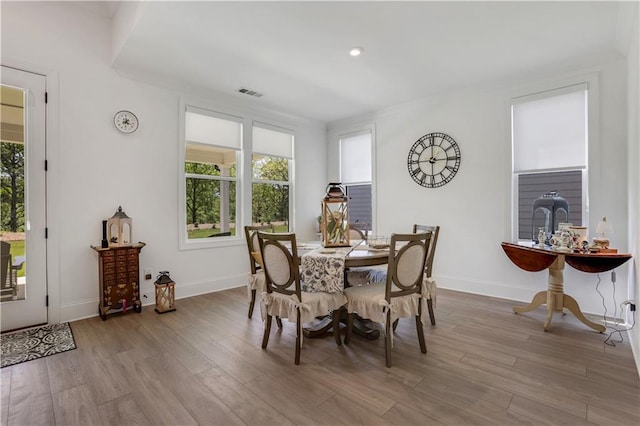 dining area featuring visible vents, recessed lighting, baseboards, and wood finished floors