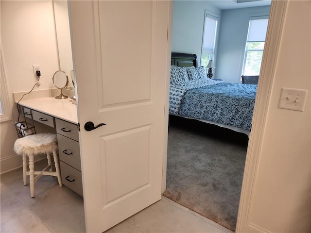 interior space featuring light tile patterned flooring