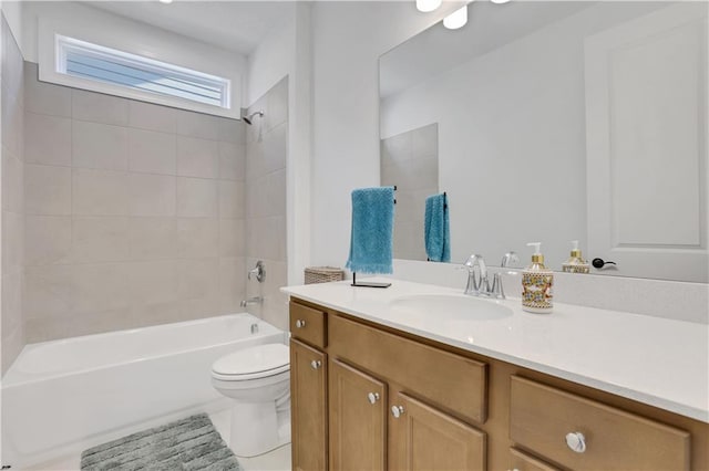 full bathroom with vanity, shower / bathing tub combination, and toilet