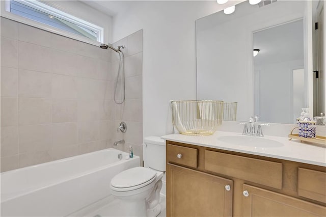 full bath featuring shower / tub combination, toilet, and vanity