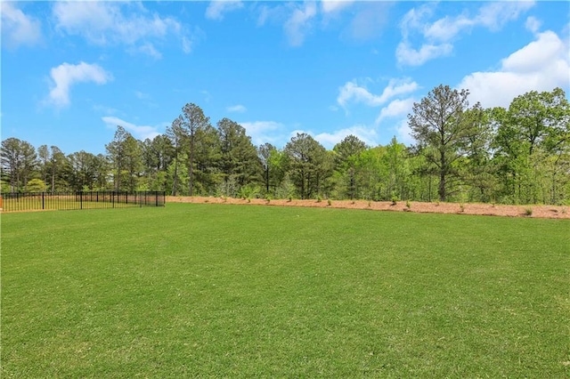view of yard with fence