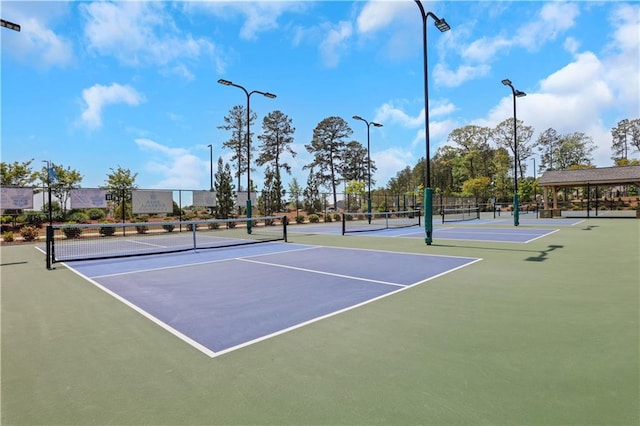 view of sport court featuring community basketball court and fence