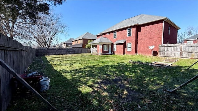 view of yard featuring a fenced backyard