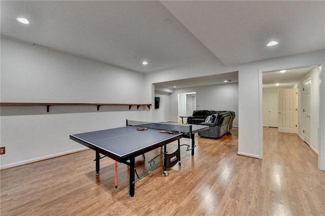 recreation room with recessed lighting, light wood-type flooring, and baseboards