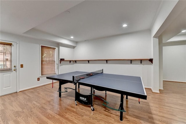 recreation room featuring recessed lighting, baseboards, and wood finished floors