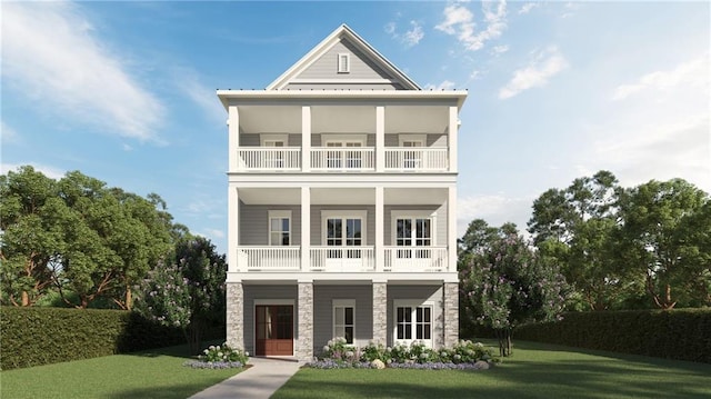 view of front of property with a balcony and a front yard