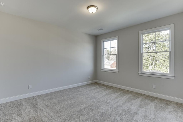 view of carpeted spare room