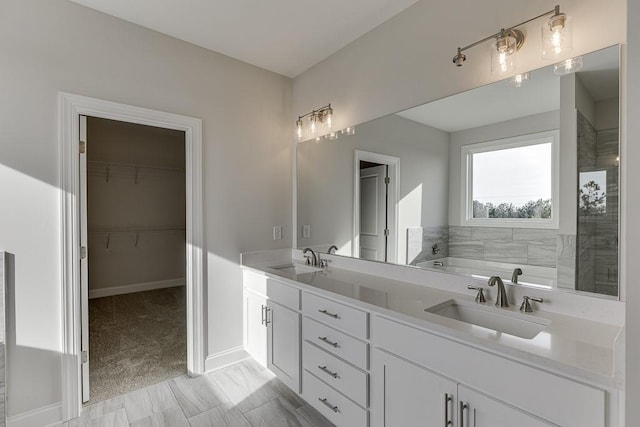 bathroom with vanity and a bathing tub