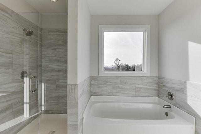 bathroom with independent shower and bath