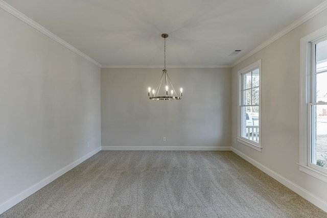 unfurnished room with an inviting chandelier, crown molding, and carpet floors