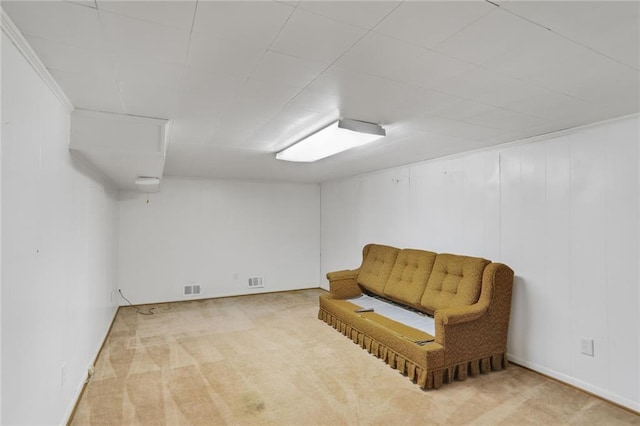 sitting room with carpet flooring and visible vents