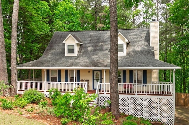 125 Misty Lea Dr, Dallas, GA 30132 - farmhouse featuring a porch, a chimney, and a shingled roof