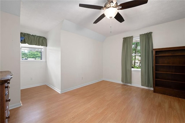 125 Misty Lea Dr, Dallas, GA 30132 - unfurnished room featuring light wood-style floors, baseboards, and a ceiling fan