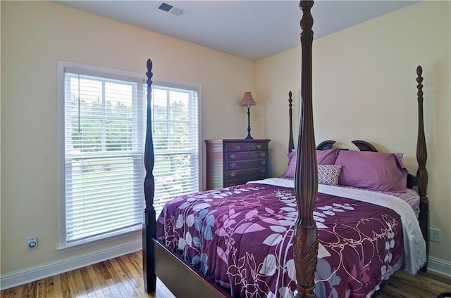 bedroom with light wood-type flooring