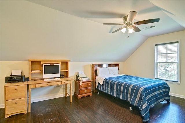 bedroom featuring ceiling fan, dark hardwood / wood-style floors, and vaulted ceiling