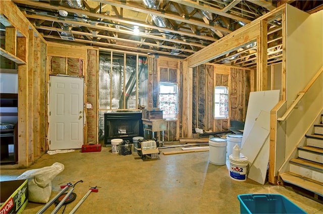 basement featuring a wood stove