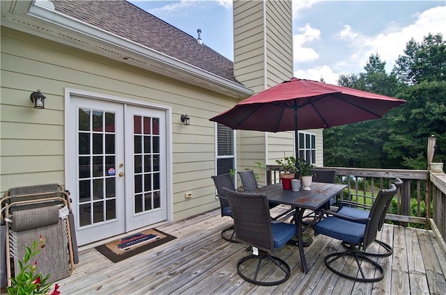 wooden terrace featuring french doors