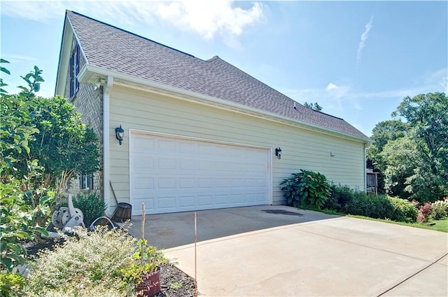 view of property exterior featuring a garage