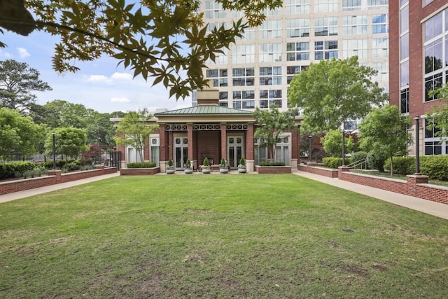 view of home's community featuring a lawn and a gazebo