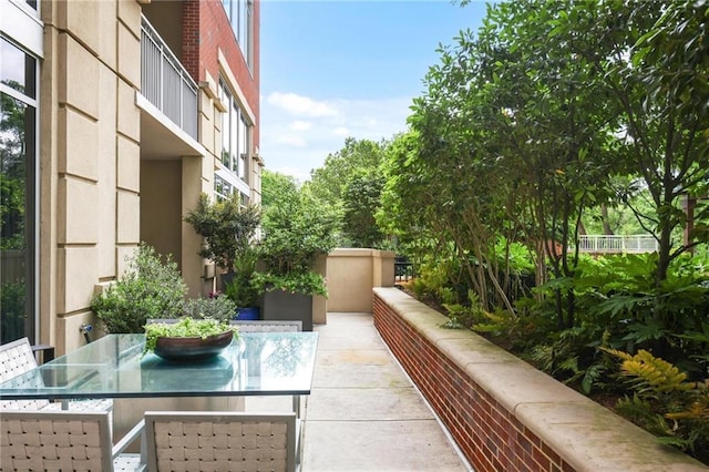 balcony with outdoor dining area