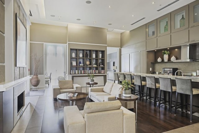 living room with a high ceiling