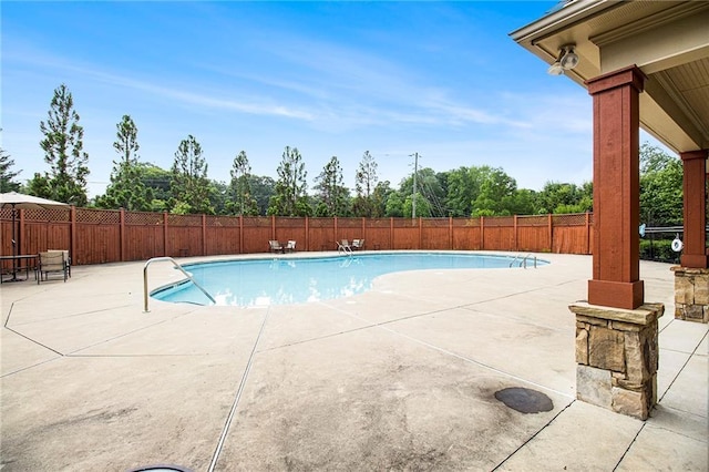 4815 Edgemoore Trce, Cumming, GA 30040 - view of swimming pool featuring a patio area and a fenced backyard