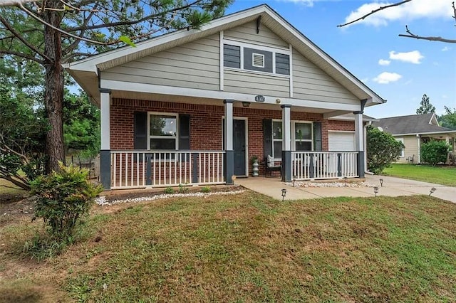 view of front of house with a front lawn and covered porch