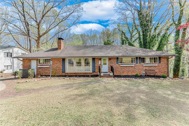 613 Holly Dr, Gainesville, GA 30501 - single story home featuring a chimney, a front lawn, and brick siding