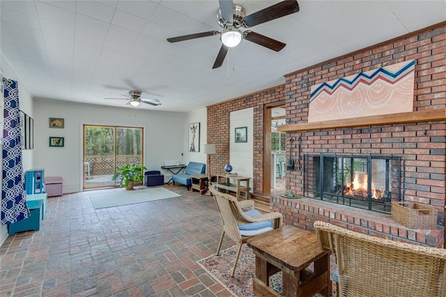 613 Holly Dr, Gainesville, GA 30501 - living area featuring a fireplace, brick floor, and a ceiling fan