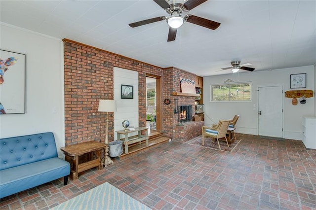 613 Holly Dr, Gainesville, GA 30501 - living area with a ceiling fan, brick floor, baseboards, and a fireplace