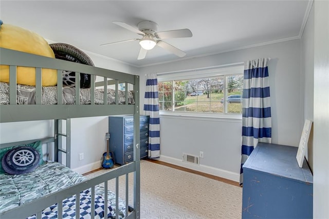 613 Holly Dr, Gainesville, GA 30501 - bedroom with baseboards, ornamental molding, visible vents, and wood finished floors