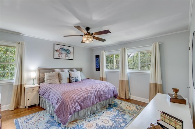 613 Holly Dr, Gainesville, GA 30501 - bedroom with ornamental molding, baseboards, and light wood-type flooring