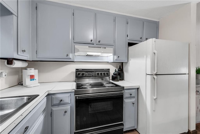 200 Villa Rd Unit 125, Jasper, GA 30143 - kitchen with black / electric stove, freestanding refrigerator, under cabinet range hood, gray cabinetry, and light countertops