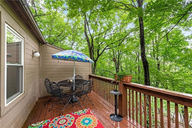 200 Villa Rd Unit 125, Jasper, GA 30143 - deck with outdoor dining area and view of scattered trees