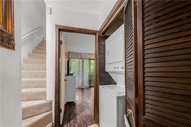 200 Villa Rd Unit 125, Jasper, GA 30143 - washroom with stacked washer / dryer, a textured ceiling, and wood finished floors