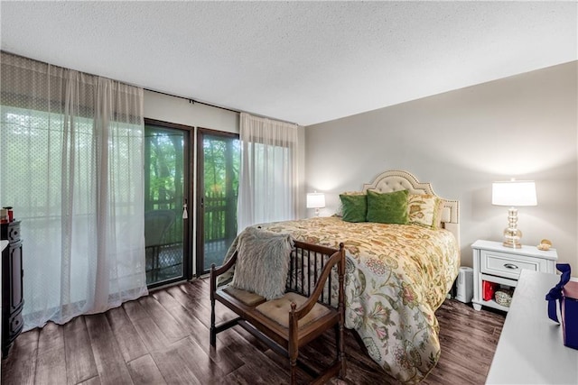 200 Villa Rd Unit 125, Jasper, GA 30143 - bedroom featuring access to exterior, wood finished floors, and a textured ceiling