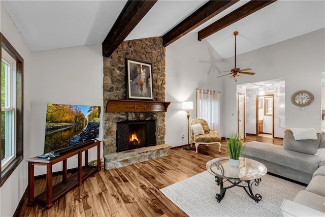 200 Villa Rd Unit 125, Jasper, GA 30143 - living area featuring a stone fireplace, wood finished floors, and a ceiling fan