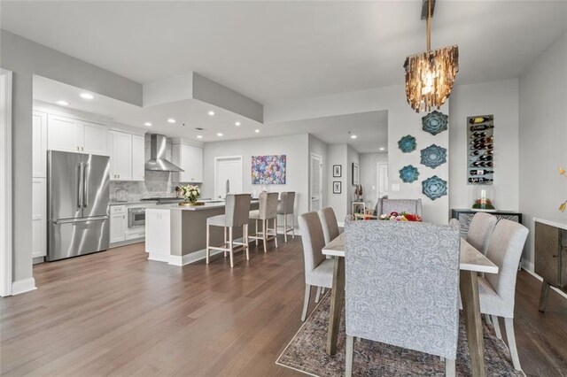 270 17th St NW Unit 2804, Atlanta, GA 30363 - dining area with dark wood finished floors, a chandelier, and recessed lighting