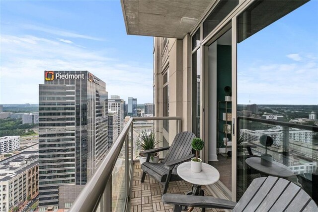270 17th St NW Unit 2804, Atlanta, GA 30363 - full bath featuring vanity, tile patterned floors, a shower with curtain, and recessed lighting