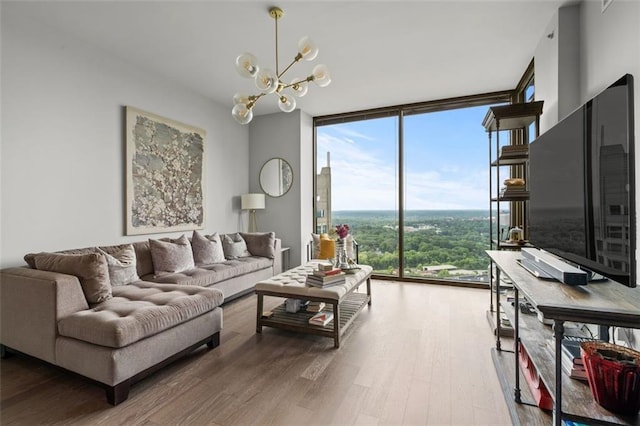 270 17th St NW Unit 2804, Atlanta, GA 30363 - living area featuring a wall of windows, wood finished floors, and a chandelier