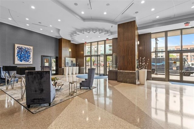 270 17th St NW Unit 2804, Atlanta, GA 30363 - home office featuring carpet flooring, a chandelier, and floor to ceiling windows