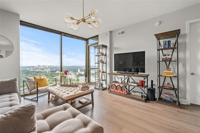 270 17th St NW Unit 2804, Atlanta, GA 30363 - living room with expansive windows, a chandelier, and wood finished floors