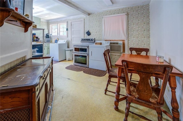 kitchen featuring beamed ceiling, washer / clothes dryer, and double oven range