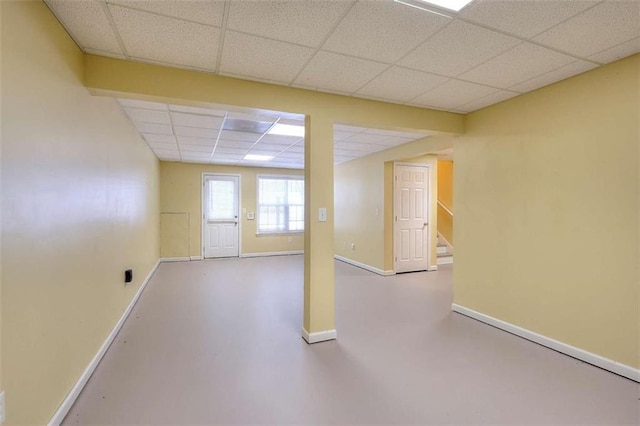 662 Shady Willow Ln, Loganville, GA 30052 - spare room with a paneled ceiling, stairway, and baseboards